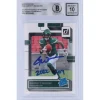 New York Jets Trading Cards^Garrett Wilson Autographed 2022 Panini Donruss Rated Rookie #306 Beckett Fanatics Witnessed Authenticated 10 Rookie Card With "2022 OROY" Inscription