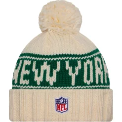 Women New York Jets Hats | Women^Women's New Era Cream 2024 Sideline Cuffed Knit Hat With Pom